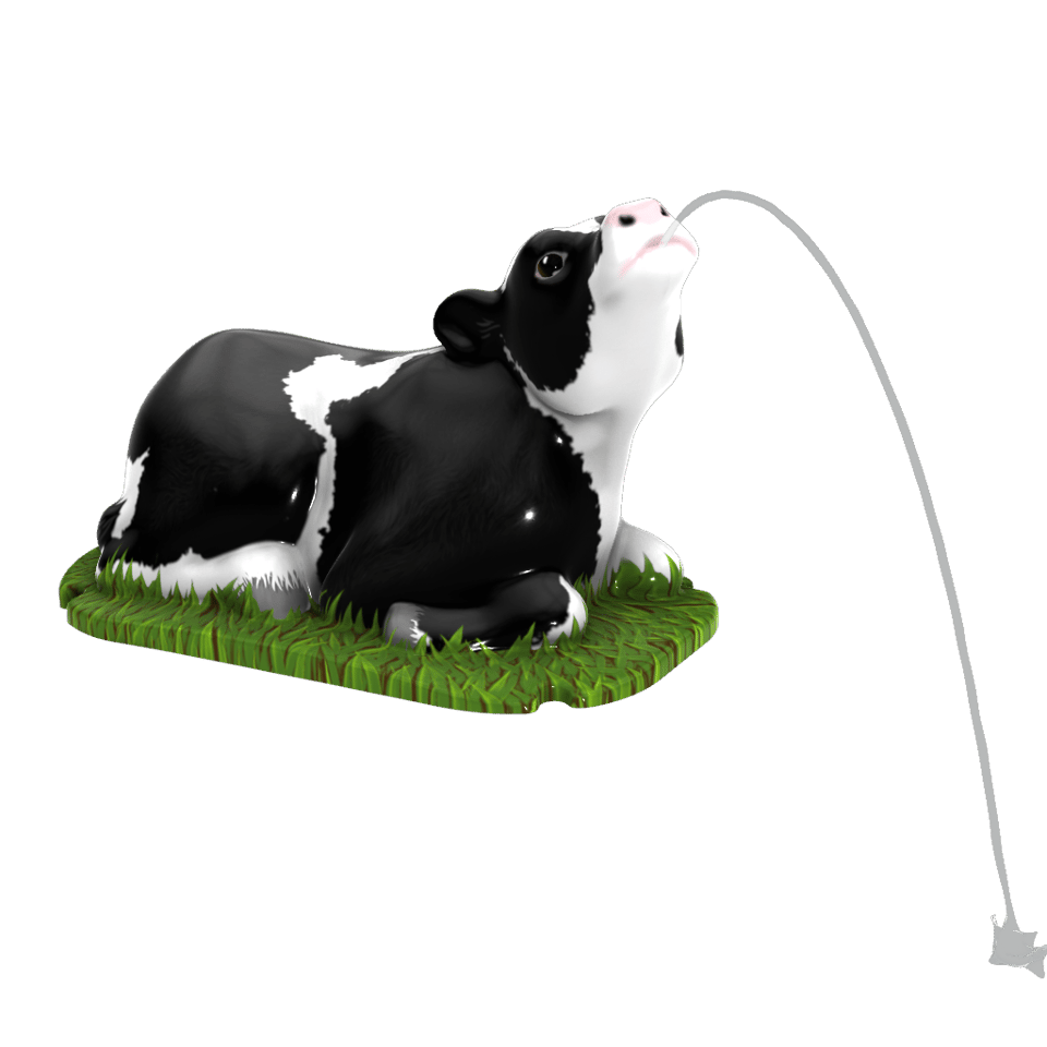 black and white dairy cow-themed sprayer laying in a bed of green grass